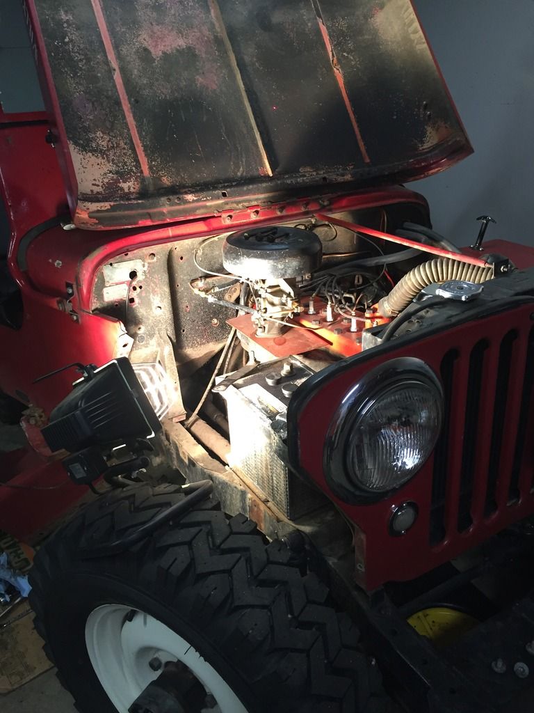 Willys with fender off for Studebaker valve adjustment access